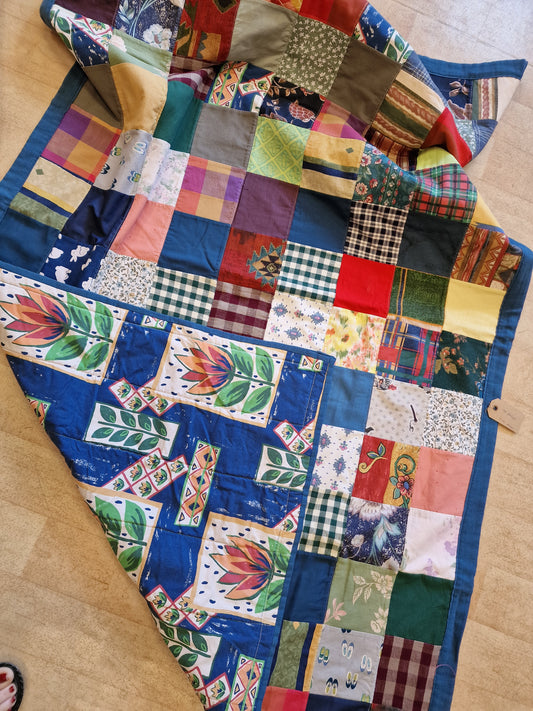 Quiltet tepper i firkanter.