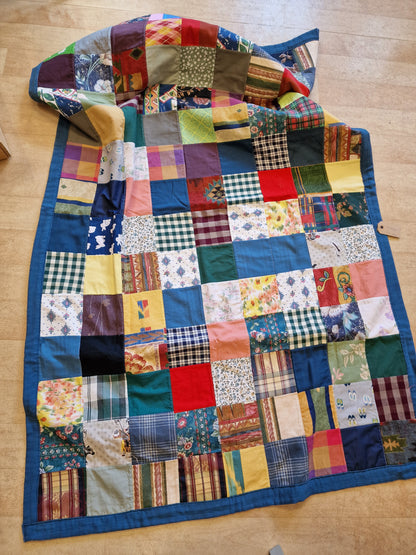 Quiltet tepper i firkanter.