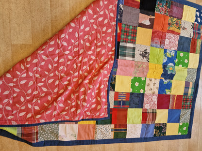 Quiltet tepper i firkanter.