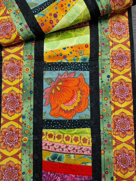 Løper i lappeteknikk