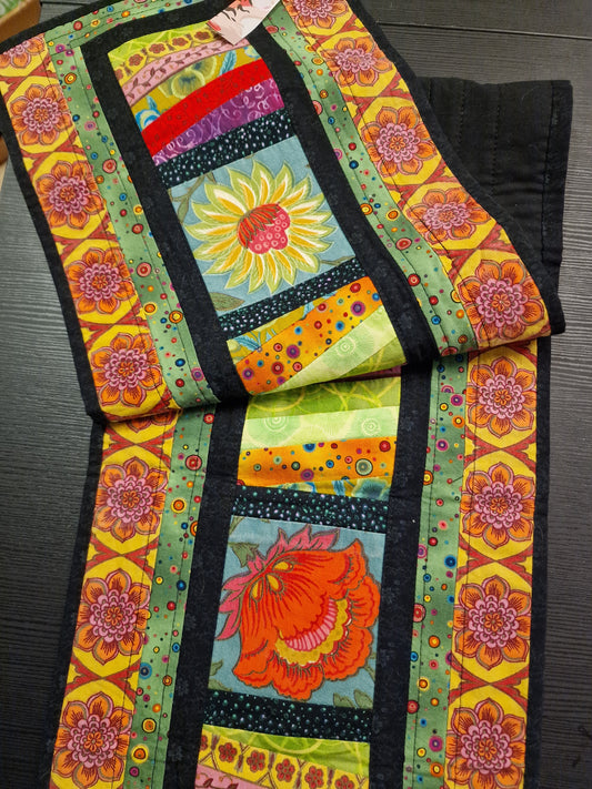 Løper i lappeteknikk